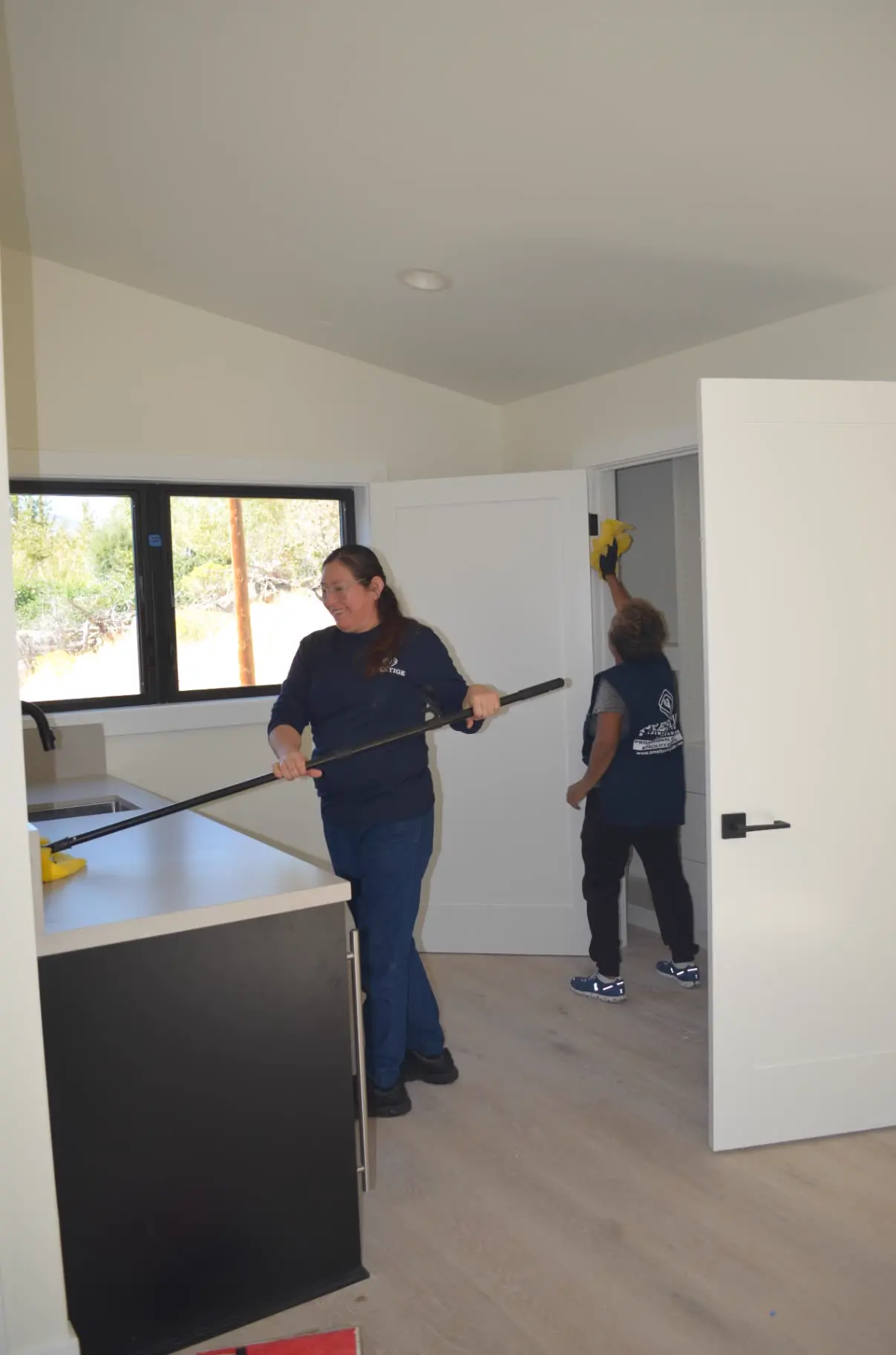 Prestige of Nevada crew member cleaning a commercial facility