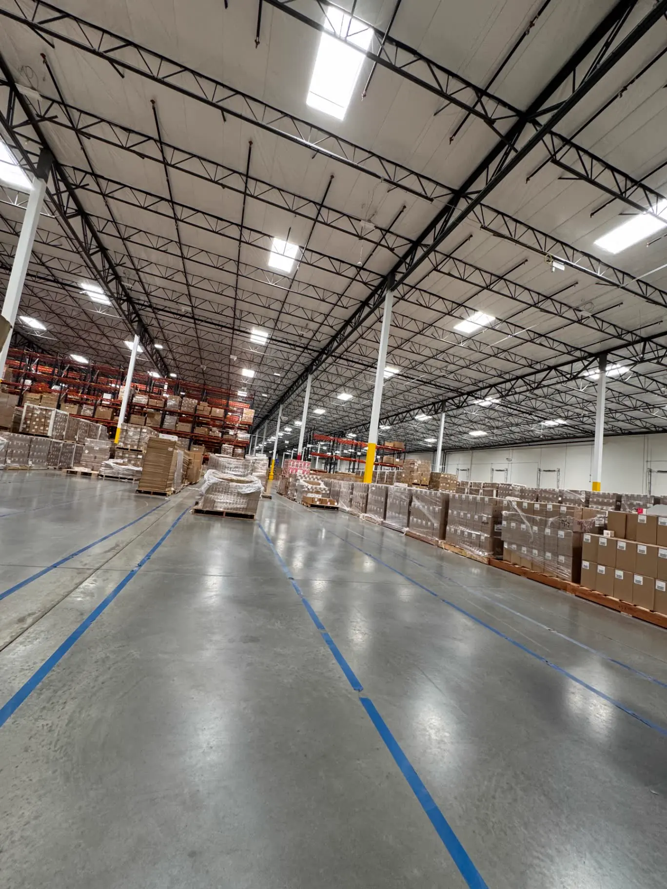 Commercial warehouse floor maintained by a Prestige of Nevada cleaning crew